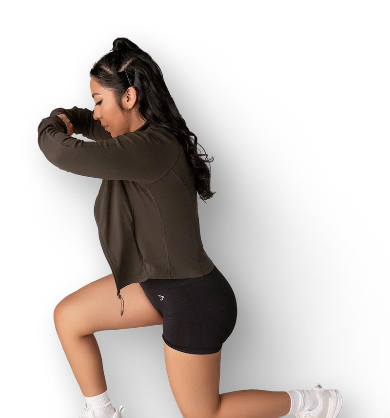 Coach Jess doing a squat